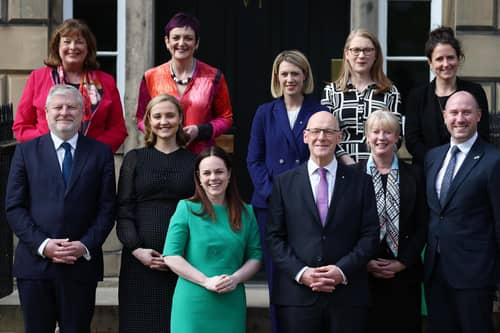 Newly appointed First Minister John Swinney (bottom, centre-right) and Deputy First Minister Kate Forbes (bottom, centre-left pose for a photo with their new Cabinet. Picture: Jeff J Mitchell/Getty Images)