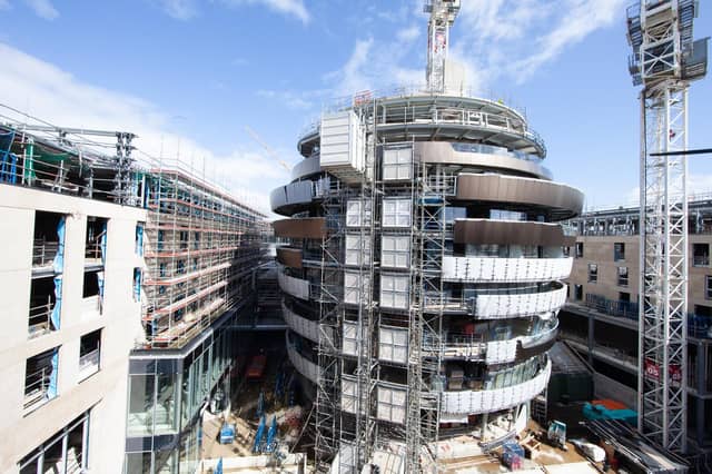The W hotel is clearly recognisable with its distinctive ribbon design. All images by John Gilchrist.