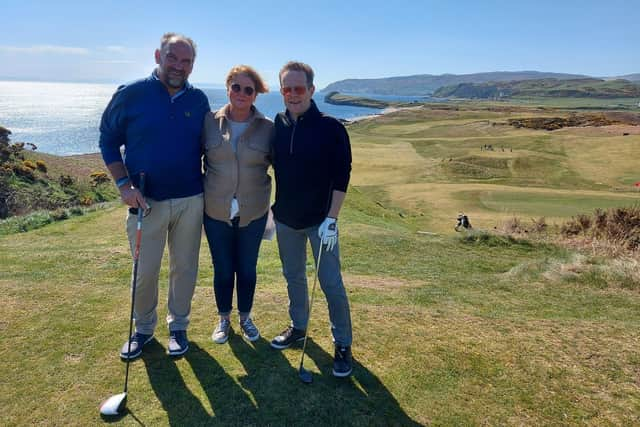 Martin Dempster, left, at Dunaverty Golf Club with his wife Carol and fellow golf writer Nick Rodger.