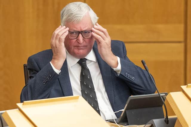Fergus Ewing during First Minster's Questions (FMQ's) at the Scottish Parliament. Photo credit should read: Jane Barlow/PA Wire