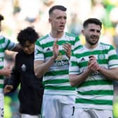 Celtic's David Turnbull (left) and Greg Taylor applaud the fans after the 4-0 win over Ross County. (Photo by Alan Harvey / SNS Group)