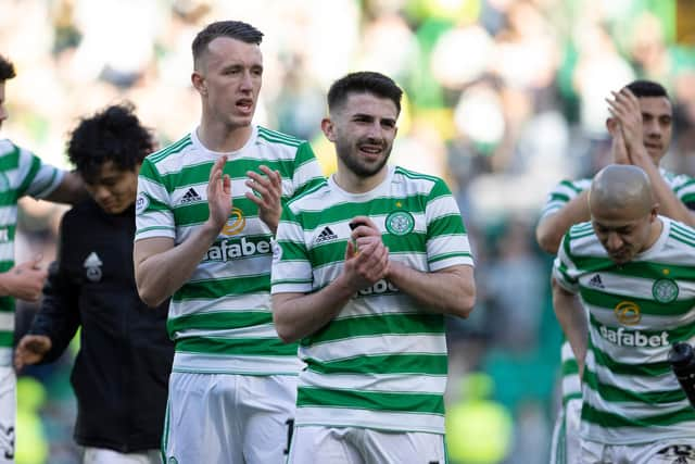 Celtic's David Turnbull (left) and Greg Taylor applaud the fans after the 4-0 win over Ross County. (Photo by Alan Harvey / SNS Group)