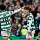 Celtic's Kyogo Furuhashi (right) celebrates with Reo Hatate after scoring his side second goal against St Mirren.