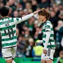 Celtic's Kyogo Furuhashi (right) celebrates with Reo Hatate after scoring his side second goal against St Mirren.