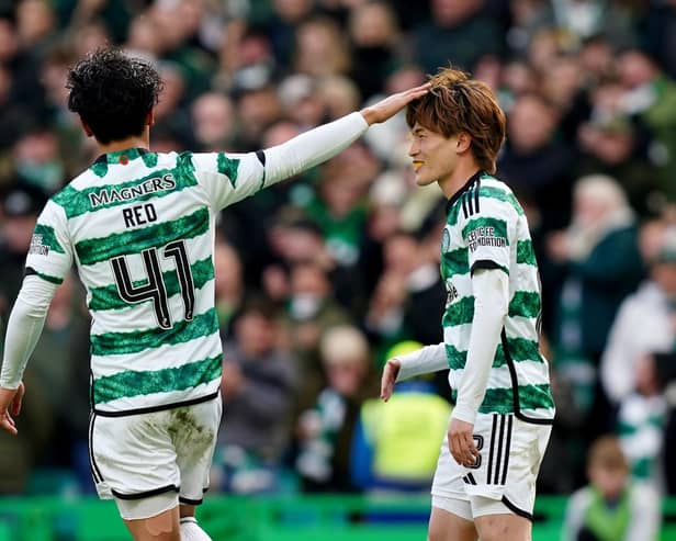 Celtic's Kyogo Furuhashi (right) celebrates with Reo Hatate after scoring his side second goal against St Mirren.