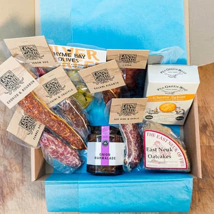 The Savoury Sharing Hamper from East Coast Cured includes a selection of the charcuterie's award-winning salamis alongside other savoury Scottish and English snacks.