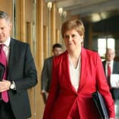 Derek Mackay and Nicola Sturgeon, pictured before the former resigned in disgrace in 2020.