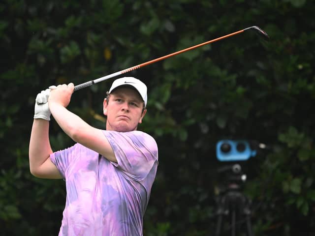 Bob MacIntyre tees off on the seventh hole during day four of the BMW PGA Championship at Wentworth Club. Picture: Ross Kinnaird/Getty Images.