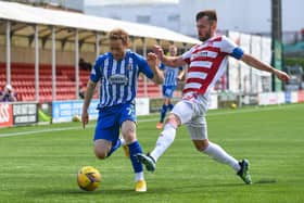 Kilmarnock's Rory McKenzie (left) is closed down by Hamilton's Scott McMann during the Rugby Park's last day victory - a result that could not spare them the play-offs but send them into the ties against Dundee in decent form. (Photo by Craig Foy / SNS Group)