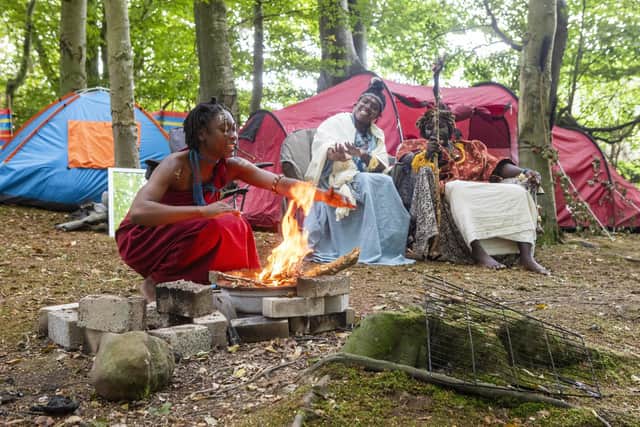 Self-proclaimed King Atehehe, Queen Nandi and handmaiden Asnat set up camp in Jedburgh. (Pic: SWNS)