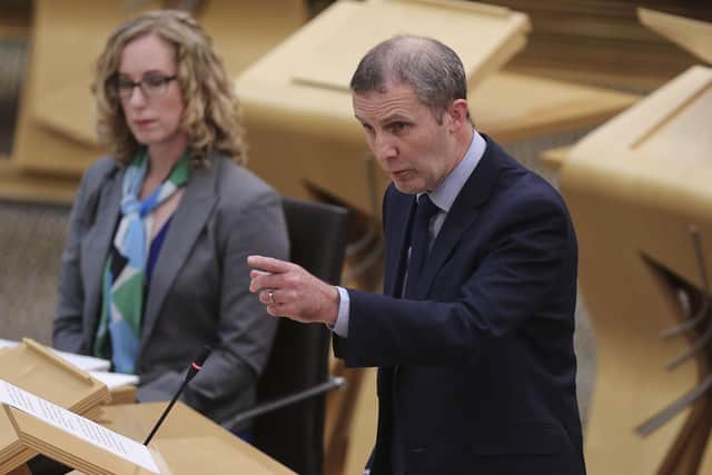 Michael Matheson MSP Cabinet Secretary for Net Zero, Energy and Transport during a Scottish Government Debate about "global ambitions for Cop26" at the Scottish Parliament in Edinburgh. Picture date: Wednesday October 27, 2021.