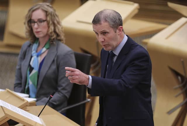 Michael Matheson MSP Cabinet Secretary for Net Zero, Energy and Transport during a Scottish Government Debate about "global ambitions for Cop26" at the Scottish Parliament in Edinburgh. Picture date: Wednesday October 27, 2021.