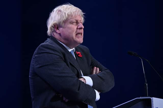 Boris Johnson speaks during a press conference at the COP26 climate change summit (Picture: Oli Scarff/AFP via Getty Images)