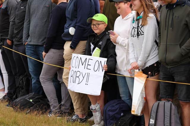 A young fan displays a sign in support of Rory McIlroy at St Andrews. Picture: Kevin C. Cox/Getty Images.