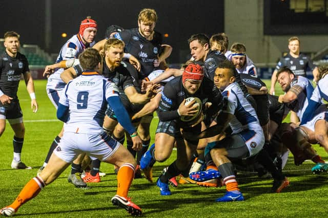 Glasgow Warriors' George Turner forces his way over for a second-half try.