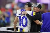 Cooper Kupp of the Los Angeles Rams celebrates with general manager Les Snead after Super Bowl LVI.