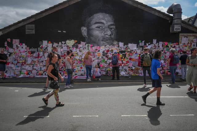 A mural of England footballer Marcus Rashford, which was defaced by vandals as he and other players were subjected to racist abuse, has attracted a huge amount of messages of goodwill from the public (Picture: Christopher Furlong/Getty Images)