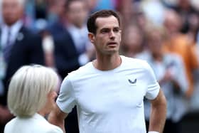 An emotional Andy Murray speaks to Sue Barker on Centre Court following the Wimbledon men's doubles match with brother Jamie. (Photo by Clive Brunskill/Getty Images)