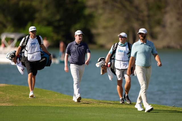 Bob MacIntyre walks up the 14th fairway with Dustin Johnson during the second day of the World Golf Championships-Dell Technologies Match Play at Austin Country Club in Texas. Picture: Darren Carroll/Getty Images.