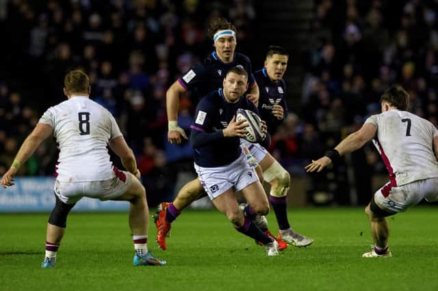 Finn Russell in action for Scotland during a Guinness Six Nations match between Scotland and England at BT Murrayfield.