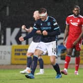 Dundee's bandaged centre-half Lee Ashcroft celebrates at full time after the 2-1 win over Aberdeen at Dens Park.  (Photo by Alan Harvey / SNS Group)