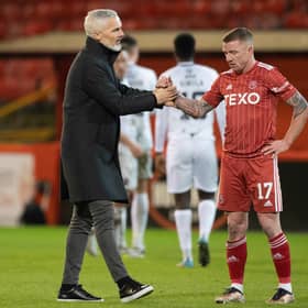 Aberdeen manager Jim Goodwin and Jonny Hayes look dejected at full time after the 0-0 draw against Ross County.