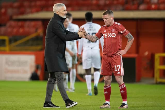 Aberdeen manager Jim Goodwin and Jonny Hayes look dejected at full time after the 0-0 draw against Ross County.