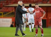 Aberdeen manager Jim Goodwin and Jonny Hayes look dejected at full time after the 0-0 draw against Ross County.