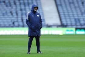 Scotland manager Steve Clarke watches training during the rain ahead of the Northern Ireland match.