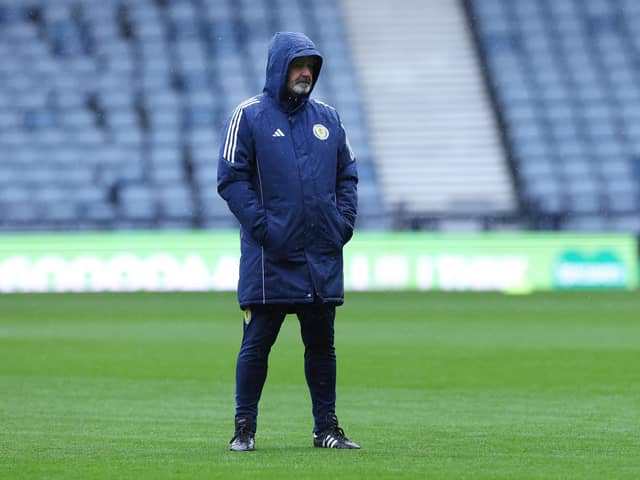 Scotland manager Steve Clarke watches training during the rain ahead of the Northern Ireland match.