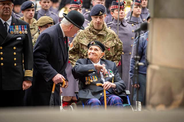Second World War veteran Jack Ransom, 101, was escorted by Major General Sir Alastair Irwin as he laid a wreath in Edinburgh on Remembrance Sunday on behalf of all veterans of the conflict.