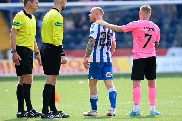 Kilmarnock's Chris Burke remonstrates with referee Euan Anderson during a cinch Championship match between Kilmarnock and Inverness Caledonian Thistle at The BBSP at Rugby Park, on August 28, 2021, in Kilmarnock, Scotland (Photo by Rob Casey / SNS Group)