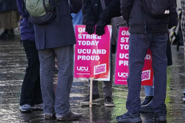 People taking part in a rally outside the Scottish Parliament, Edinburgh. Picture: Andrew Milligan/PA Wire