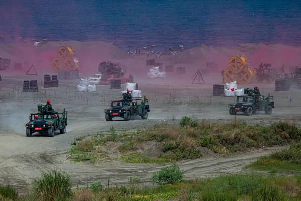 Taiwan's armed forces take part in a live-fire military exercise simulating an invasion by China (Picture: Annabelle Chih/Getty Images)