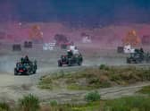 Taiwan's armed forces take part in a live-fire military exercise simulating an invasion by China (Picture: Annabelle Chih/Getty Images)
