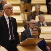 Deputy First Minister John Swinney MSP watched by First Minister Nicola Sturgeon as he delivered his budget to the Scottish Parliament.