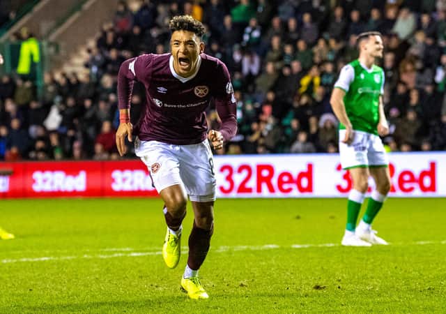 Sean Clare celebrates after scoring to make it 1-0 Hearts during the derby at Easter Road in March Photo: Ross Parker / SNS Group