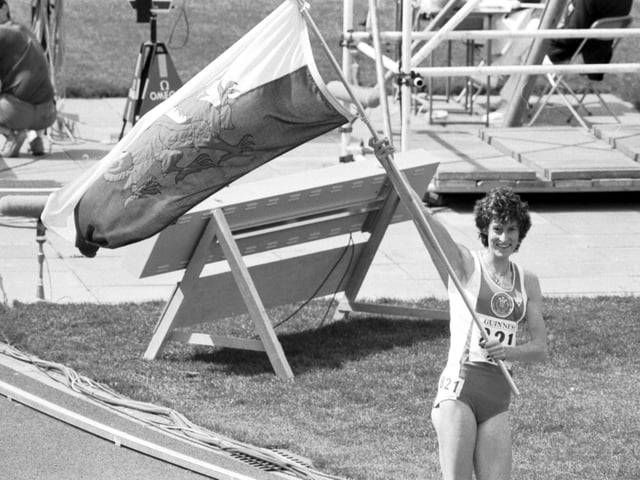 Gold medal winner Kirsty Wade waves the Welsh flag after winning the Women's 1500m final in the 1986 Commonwealth Games at Meadowbank stadium in Edinburgh.