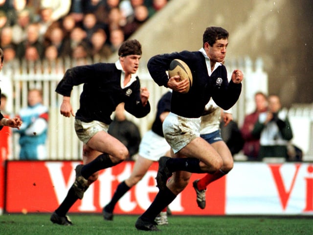Gavin Hastings is a picture of concentration as he heads for the line during the 1995 Five Nations win over France. It was Scotland's first win in Paris for 26 years and was achieved in the most dramatic of circumstances. Before Hastings' thrilling late try, France had taken the lead with eight minutes remaining when Philippe Saint-Andre took advantage of a poor clearance from Gregor Townsend. The current Scotland coach made up for the error with his memorable assist.