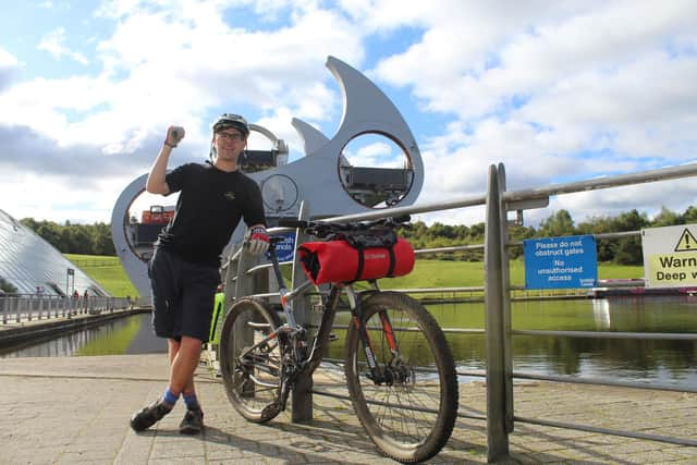 Pausing at The Falkirk Wheel to watch a boat being hoisted onto the Union Canal before the climb from Linlithgow to Bo’ness, on day two