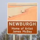 The project team erected two threshold road signs honouring McBey at either end of Newburgh.