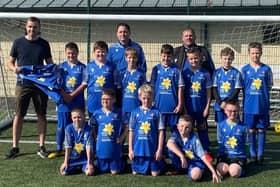 John Johnstone of Football Mindset with Lothian Colts 2012 team and their new kits.