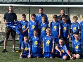 John Johnstone of Football Mindset with Lothian Colts 2012 team and their new kits.