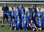 John Johnstone of Football Mindset with Lothian Colts 2012 team and their new kits.
