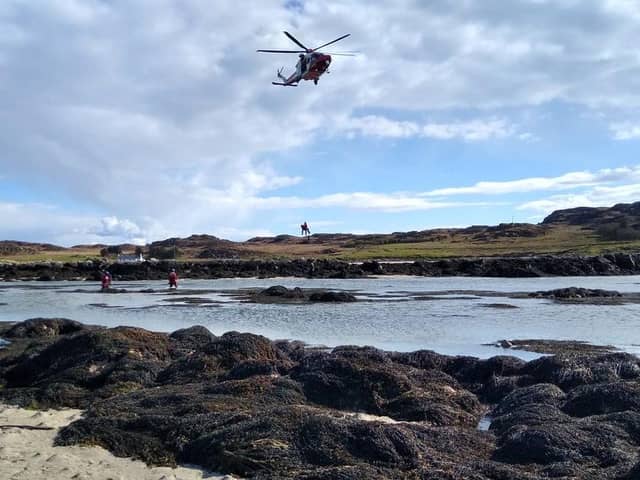 The Coast Guard helicopter winches the casualty from Mull to safety on the mainland (Photo: Craignure Coastguard Rescue Team).