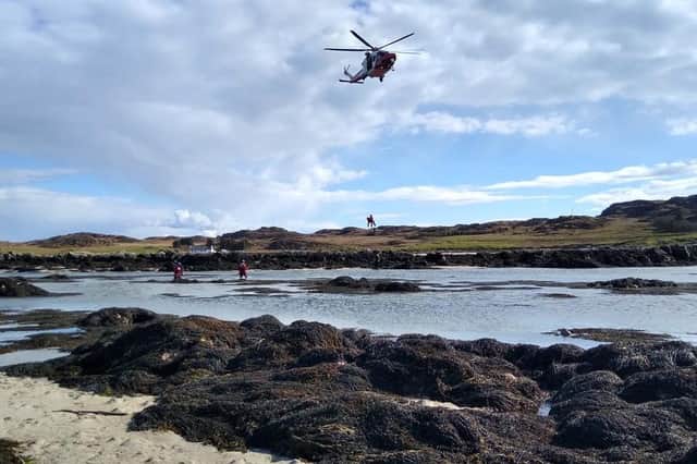 The Coast Guard helicopter winches the casualty from Mull to safety on the mainland (Photo: Craignure Coastguard Rescue Team).