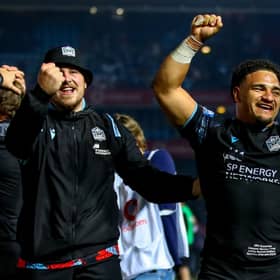 Joy for Sione Tuipulotu, right, at full-time as Glasgow Warriors celebrate their victory over Vodacom Bulls in the United Rugby Championship final at Loftus Versfeld in Pretoria, South Africa. (Photo by Gordon Arons/Gallo Images/Getty Images)