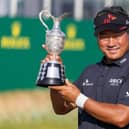 Korea's KJ Choi shows off the trophy after winning the Senior Open Championship presented by Rolex at Carnoustie Golf Links. Picture: Kenny Smith/Getty Images.