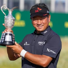 Korea's KJ Choi shows off the trophy after winning the Senior Open Championship presented by Rolex at Carnoustie Golf Links. Picture: Kenny Smith/Getty Images.