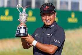 Korea's KJ Choi shows off the trophy after winning the Senior Open Championship presented by Rolex at Carnoustie Golf Links. Picture: Kenny Smith/Getty Images.